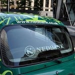 Green car with Nedbank branding